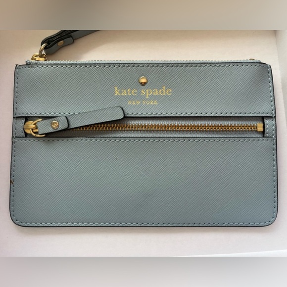 kate spade Handbags - Kate Spade Baby Blue Wristlet with Smooth Leather Finish